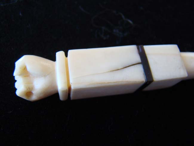 A 19th century Whale Ivory Bodkin with clenched fist knob — image 2
